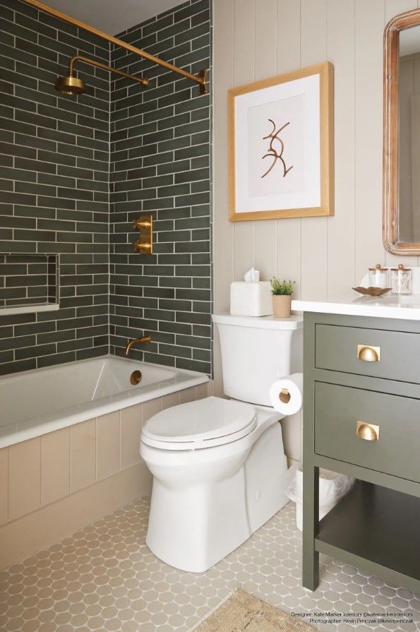 A bathroom with a toilet , sink , bathtub and shower.