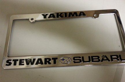 A yakima and stewart subaru license plate frame