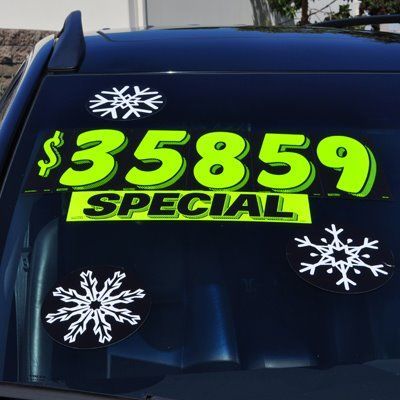 A white van with the word sale on it