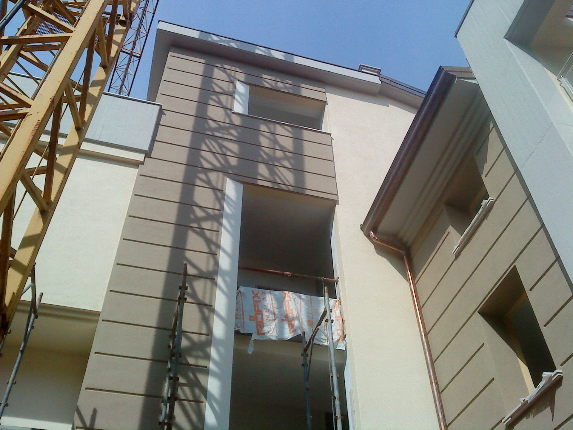 Exterior view with plaster and painting