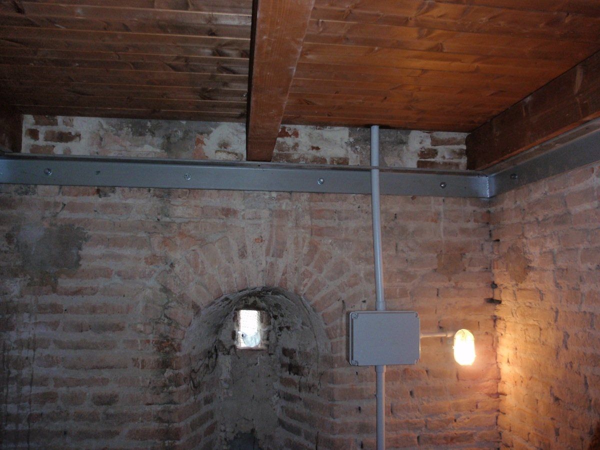 particular metal frame supporting beams of the new wooden floor