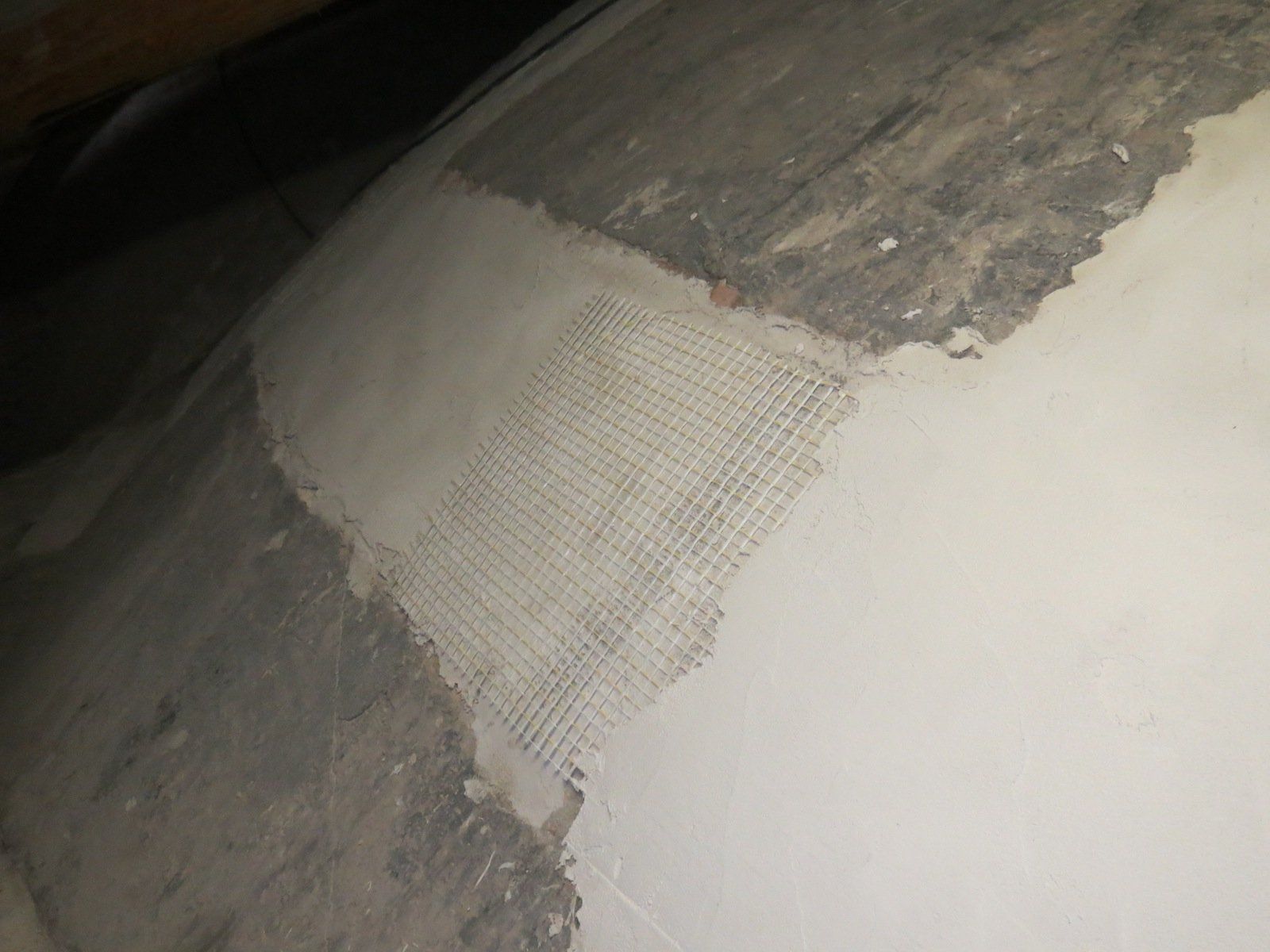 dome consolidation with fiberglass mesh