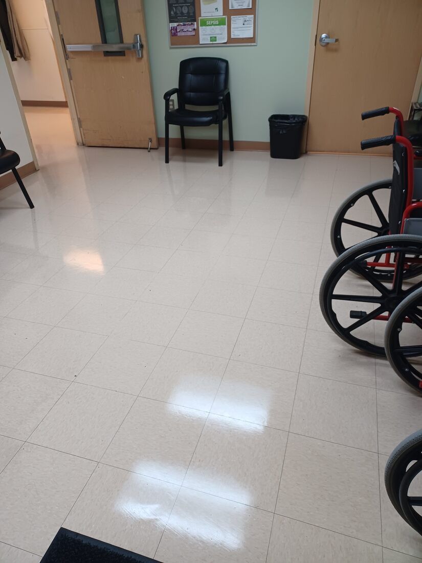 Wheelchairs lined up in a clean waiting room