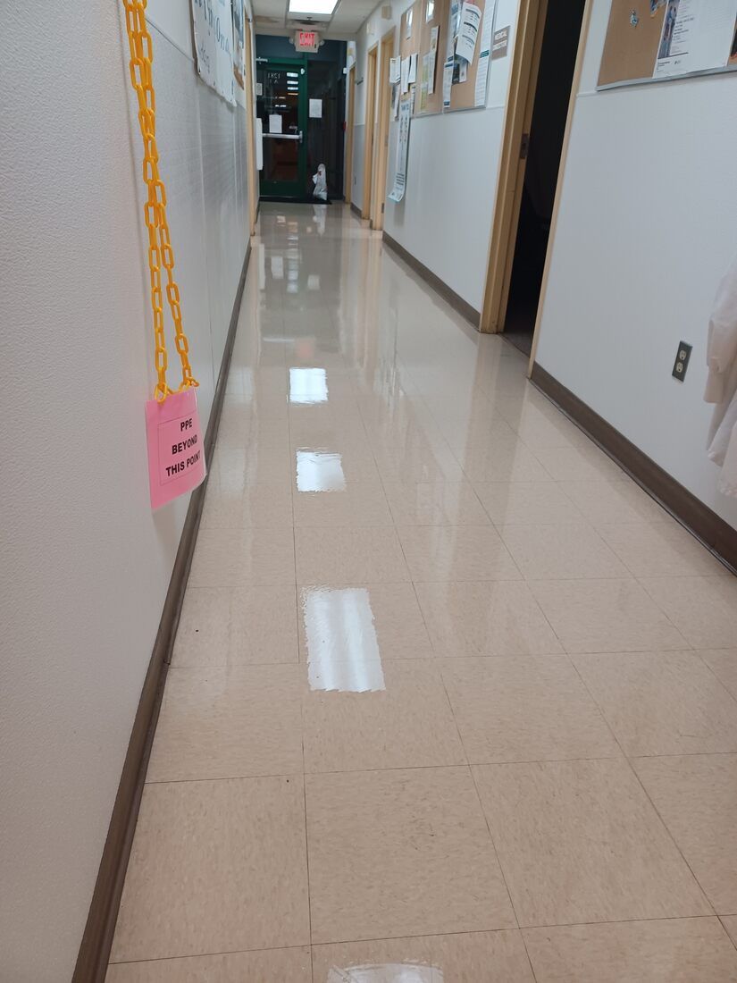 A long clean hallway in a hospital