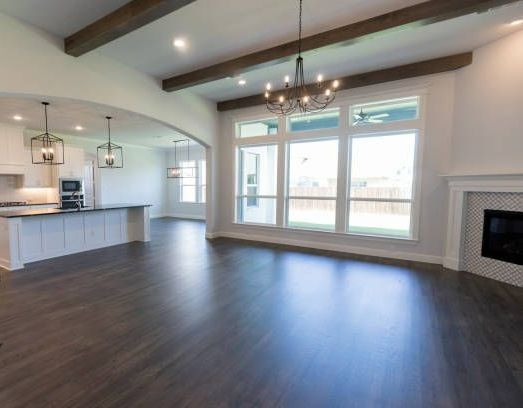 There is a large island in the middle of the kitchen.