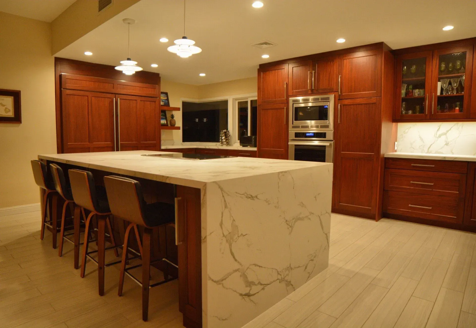 There is a large island in the middle of the kitchen.