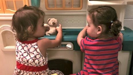 Adorable Babies Looking At Each Other — Potomac, MD — Little Acorns Early Learning Center