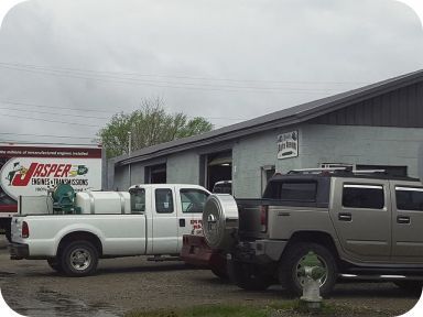 Two cars in front of the repair shop | Madden Auto Repair
