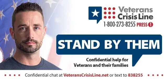Veterans crisis line banner with man’s portrait and “Stand by them” support message