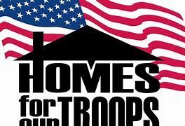 A logo for homes for troops with an american flag in the background.