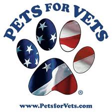 The logo for pets for vets is a paw print with an american flag on it.