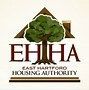 A logo for the east hartford housing authority with a tree and a house.