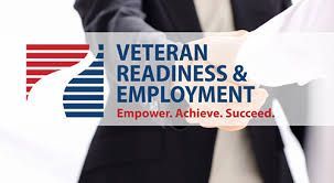 A sign for the united states department of labor is in front of a building.