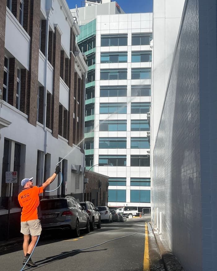 Cleaning the Exterior of a Building With a Pressure Cleaner — Excess Cleaning in Robina, QLD
