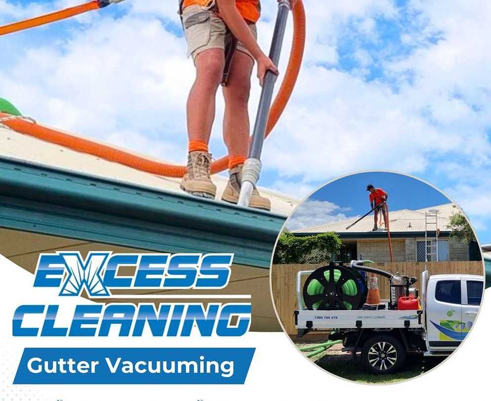 A Guy Cleaning the Gutter Using Vacuum Cleaner — Excess Cleaning in Robina, QLD