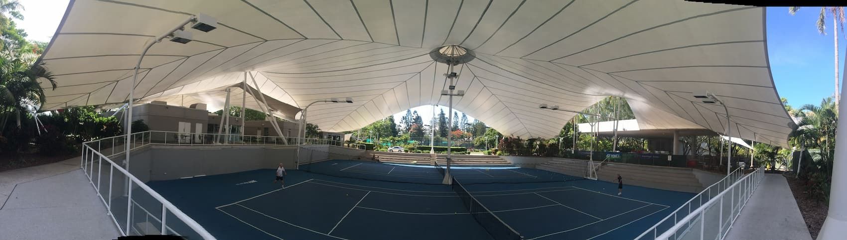 Tennis Court With Players — Excess Cleaning in Mudgeeraba, QLD