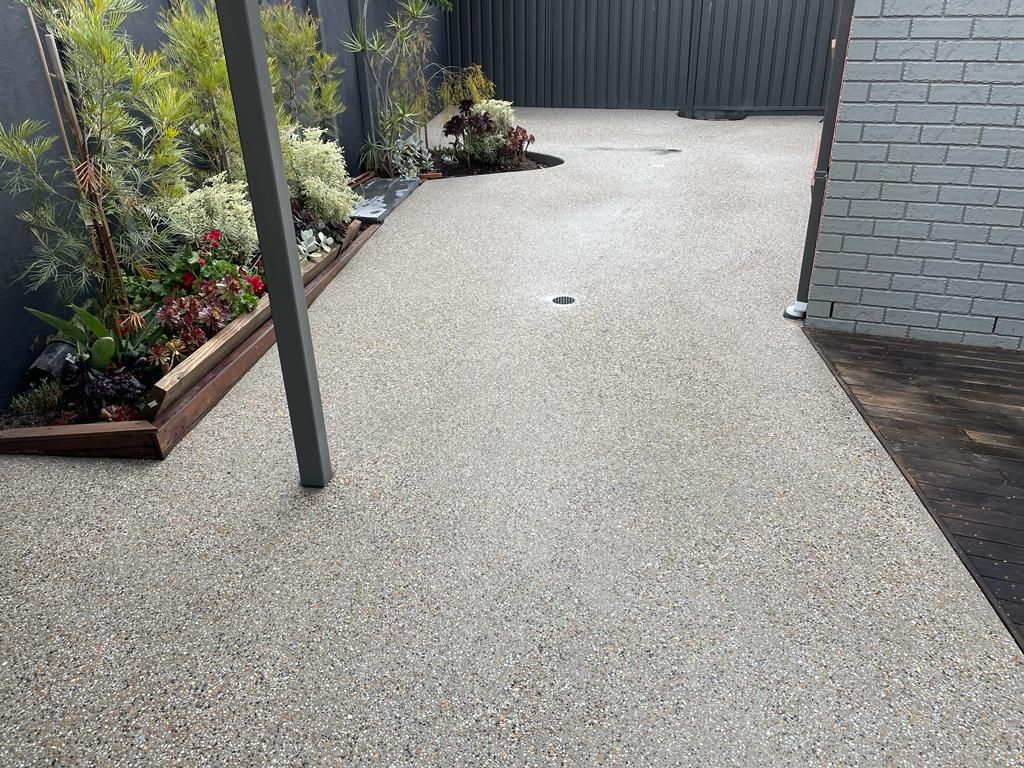 Exposed aggregate concrete driveway installed in Sunshine VIC.