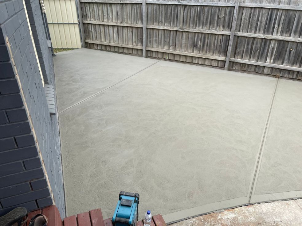 Freshly poured concrete in the backyard area of a residential property in Sunshine VIC.
