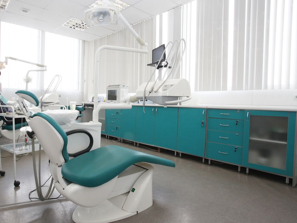 There Is A Dental Chair In The Middle Of The Room — Regal's Dental In Yeppoon, QLD