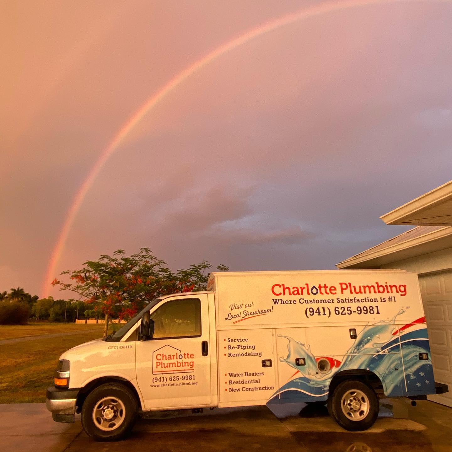 Charlotte Car Company With Rainbow At The Sky — Port Charlotte, FL — Charlotte Plumbing