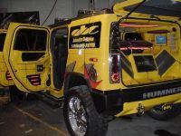 Custom Car Audio — Customized Yellow Hummer Opened Car Trunk In Chicago, IL
