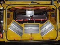 Custom Car Audio — Yellow Hummer With Customized Body Side View In Chicago, IL