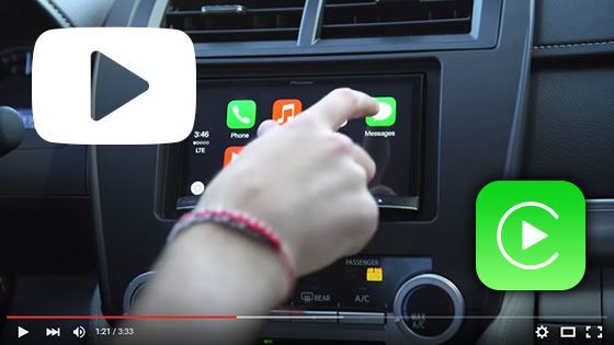 A person is playing a video on a car radio