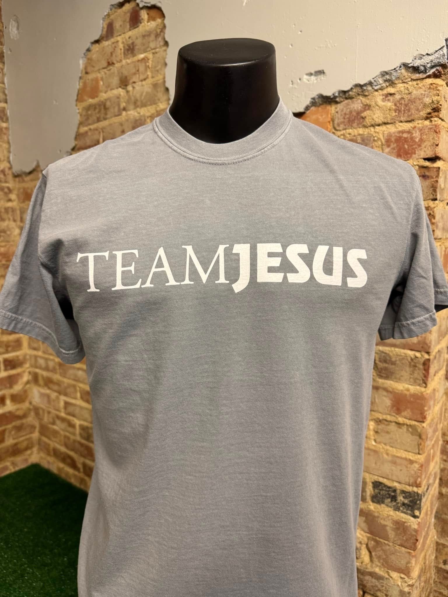 A grey t-shirt with the word teamjesus on it is on a mannequin.