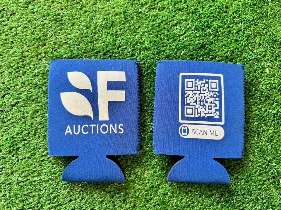 Two blue can holders with a qr code on them for auctions