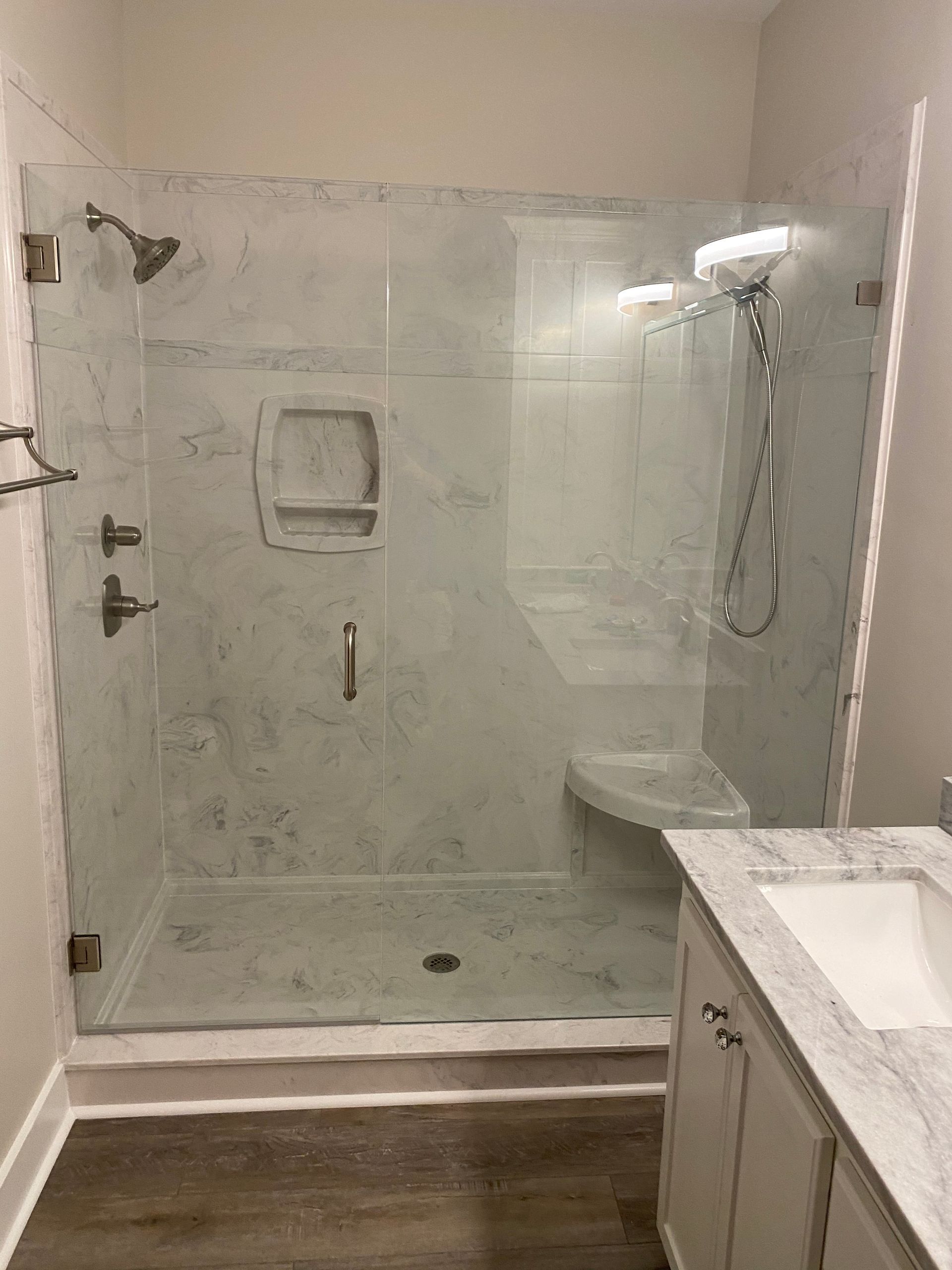 A Bathroom with A Walk in Shower and A Sink - New Orleans, LA - The Clear Choice