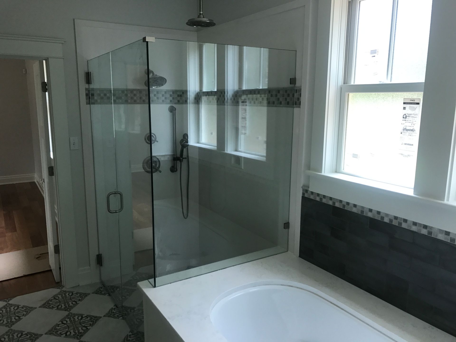 A Bathroom with A Walk-in Shower and A Bathtub - New Orleans, LA - The Clear Choice