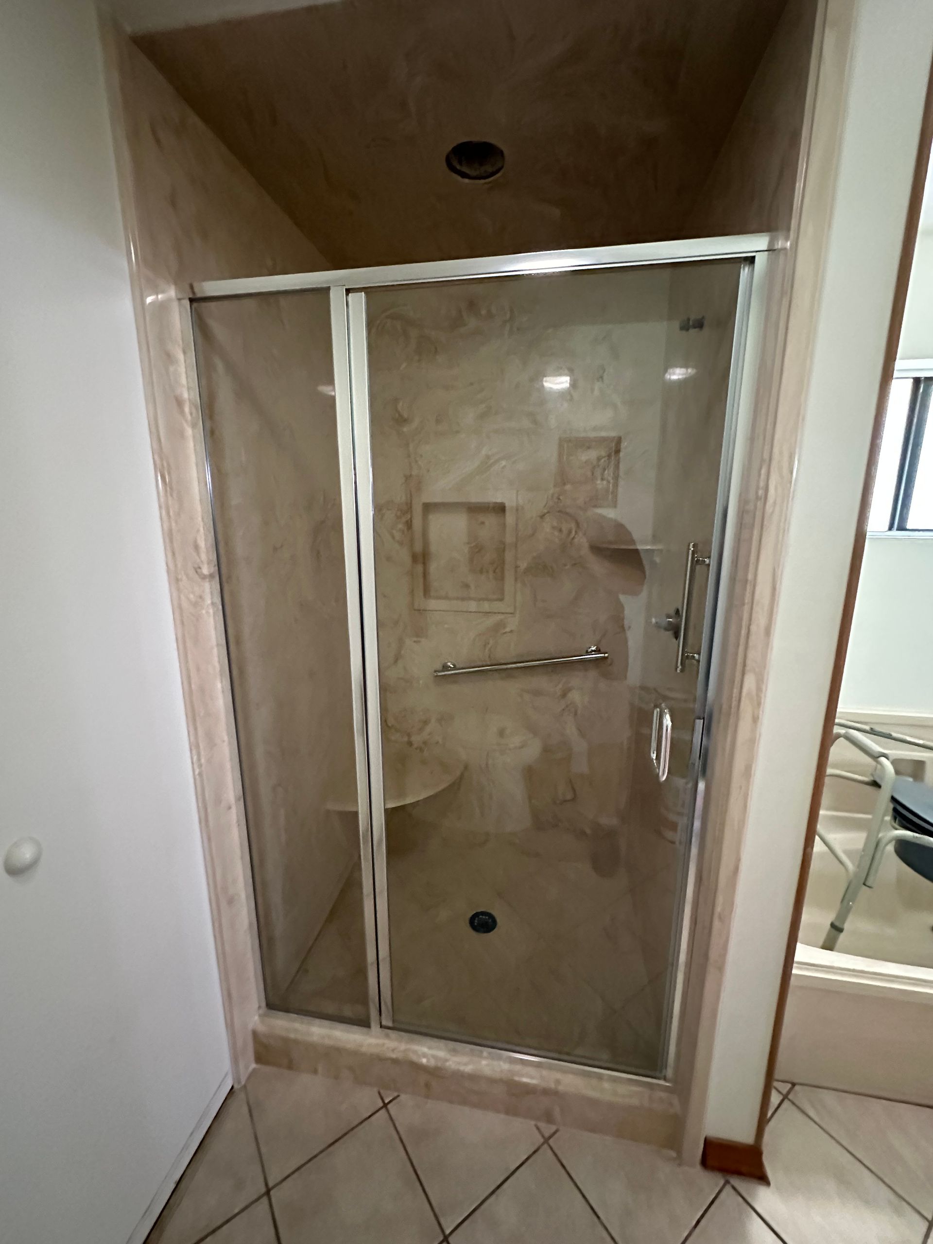 A Bathroom with A Walk-in Shower with A Glass Door - New Orleans, LA - The Clear Choice