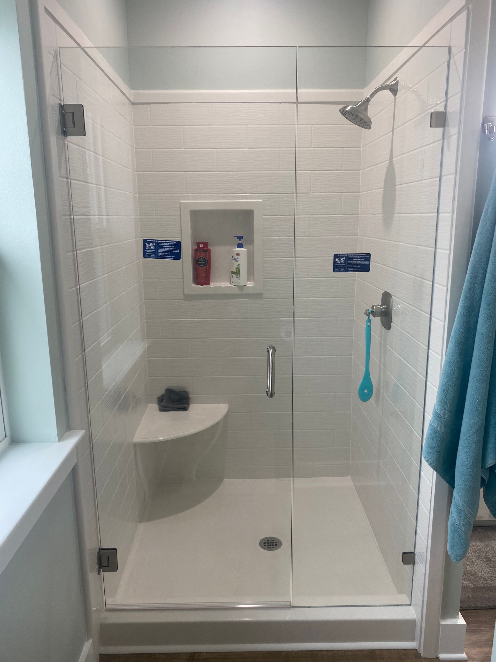 A Bathroom with A Walk-in Shower with A Glass Door - New Orleans, LA - The Clear Choice