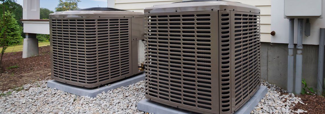 Air Conditioner Units Outside of Residential Property - HVAC Services in Staunton, VA