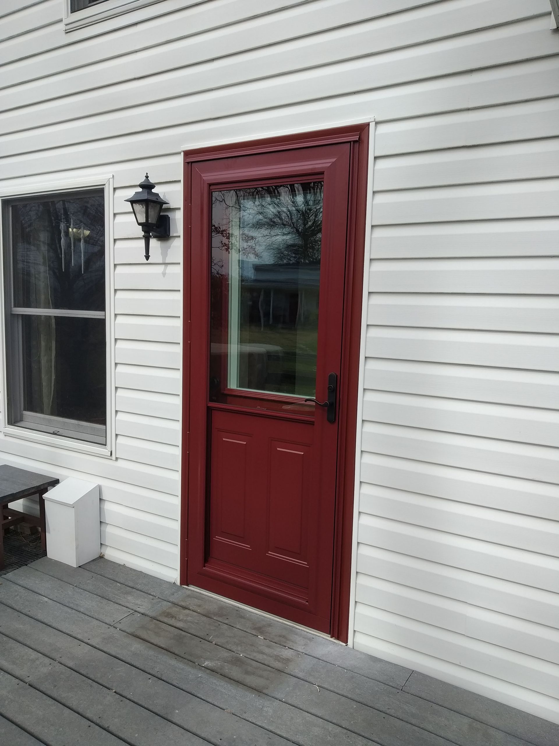 red back door with glass panel