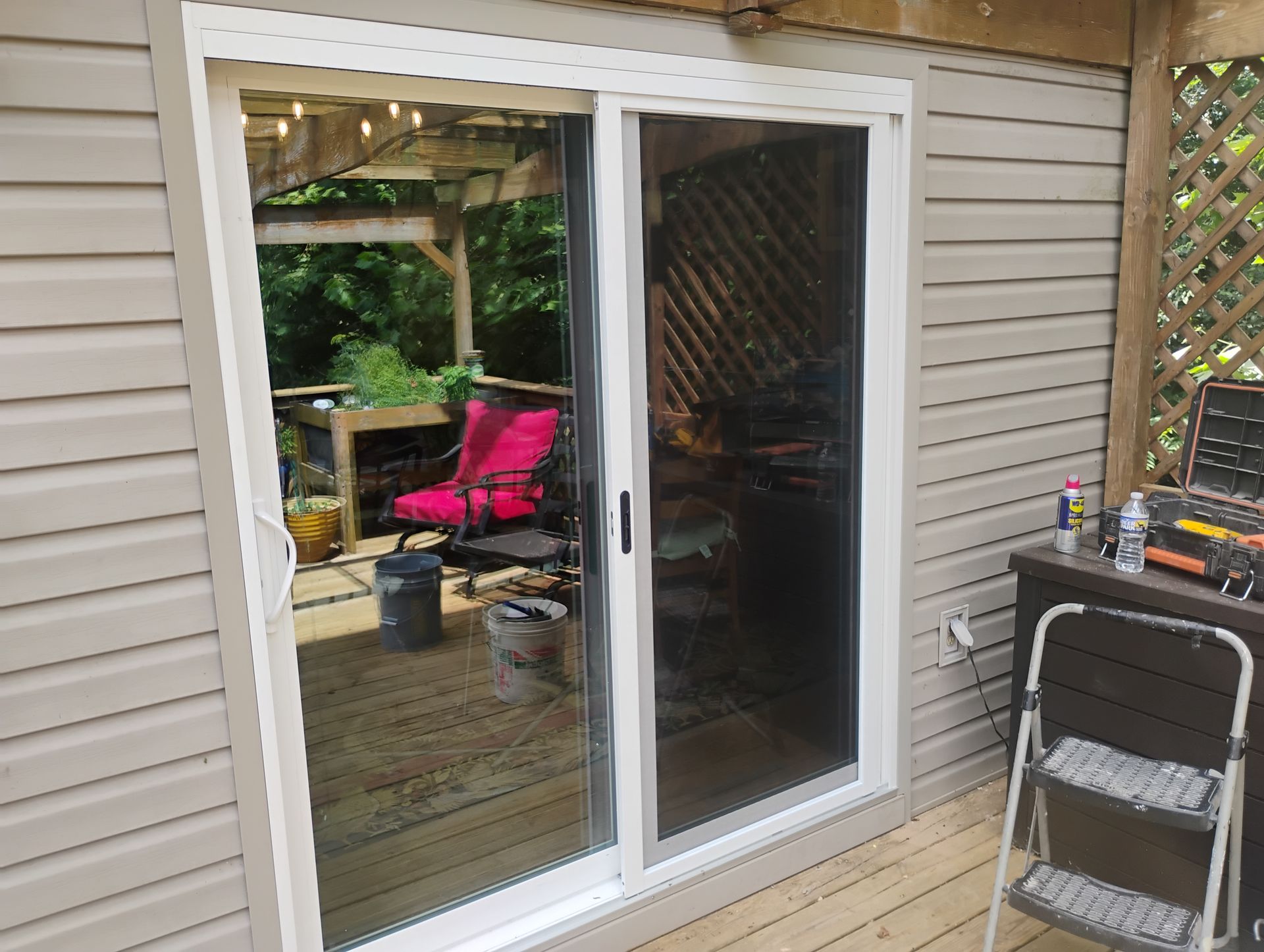 white sliding glass door on back deck