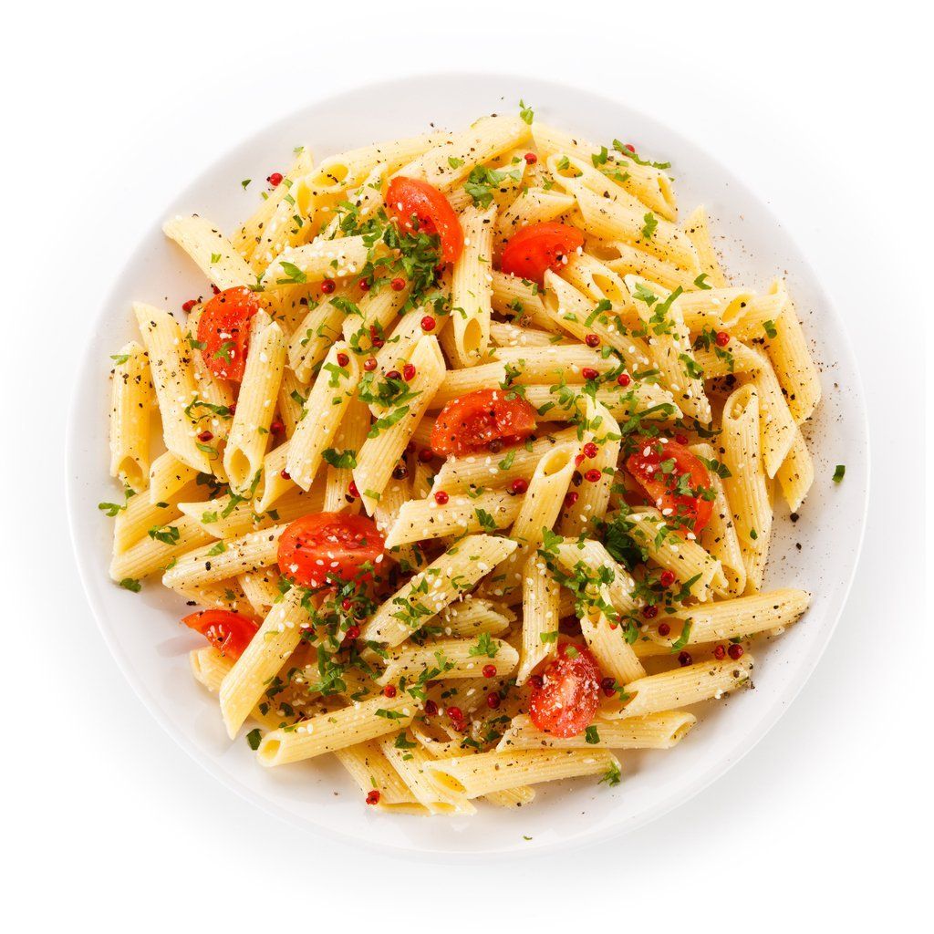 A white plate topped with pasta and tomatoes on a white background.