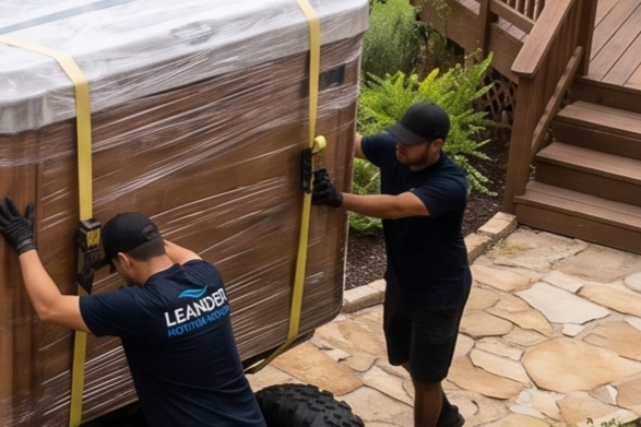 Professional movers handling heavy spa equipment installation prep