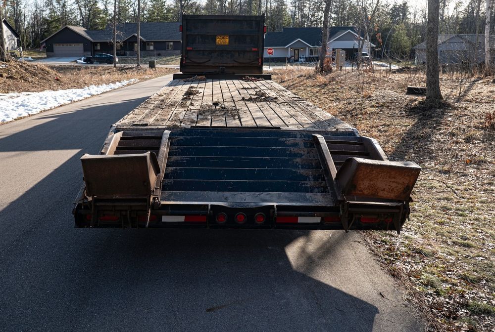 A Lowboy Trailer on a Road — Compass Equipment Hire in Nimbin, NSW