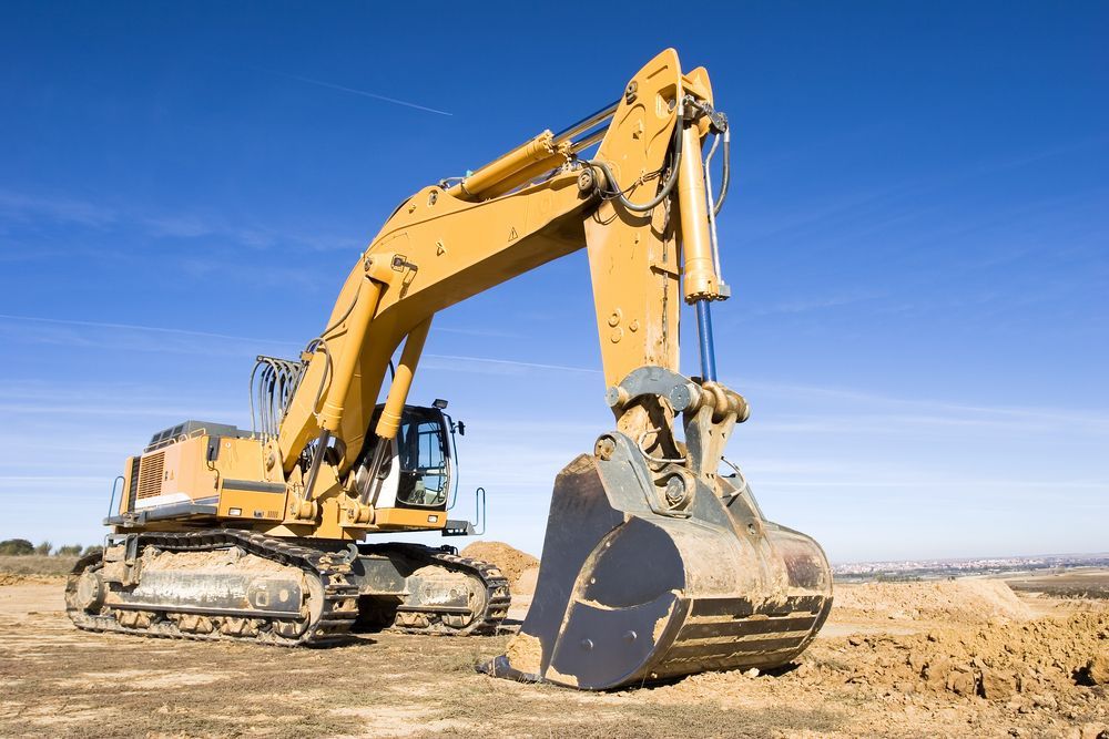 Yellow Excavator on Dirt — Compass Equipment Hire in Woodburn, NSW