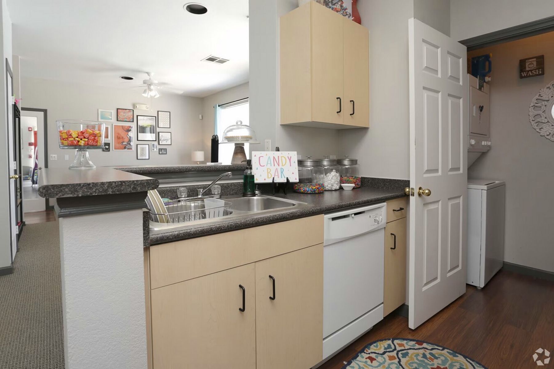 Fully equipped kitchen at Milestone Stillwater with ample counter space and white cabinetry.