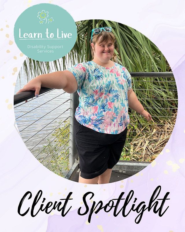 A Woman is Standing Next to a Railing in Front of a Body of Water — Learn to Live in Idalia, QLD