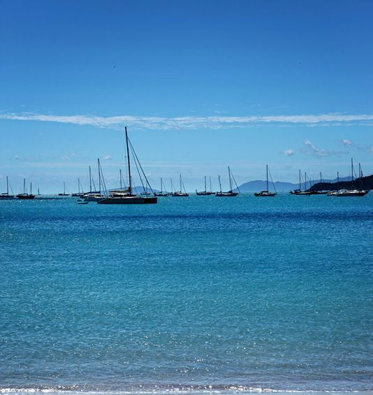 A Clear Blue Sky Adorned With Fluffy White Clouds — Learn to Live in South Townsville, QLD