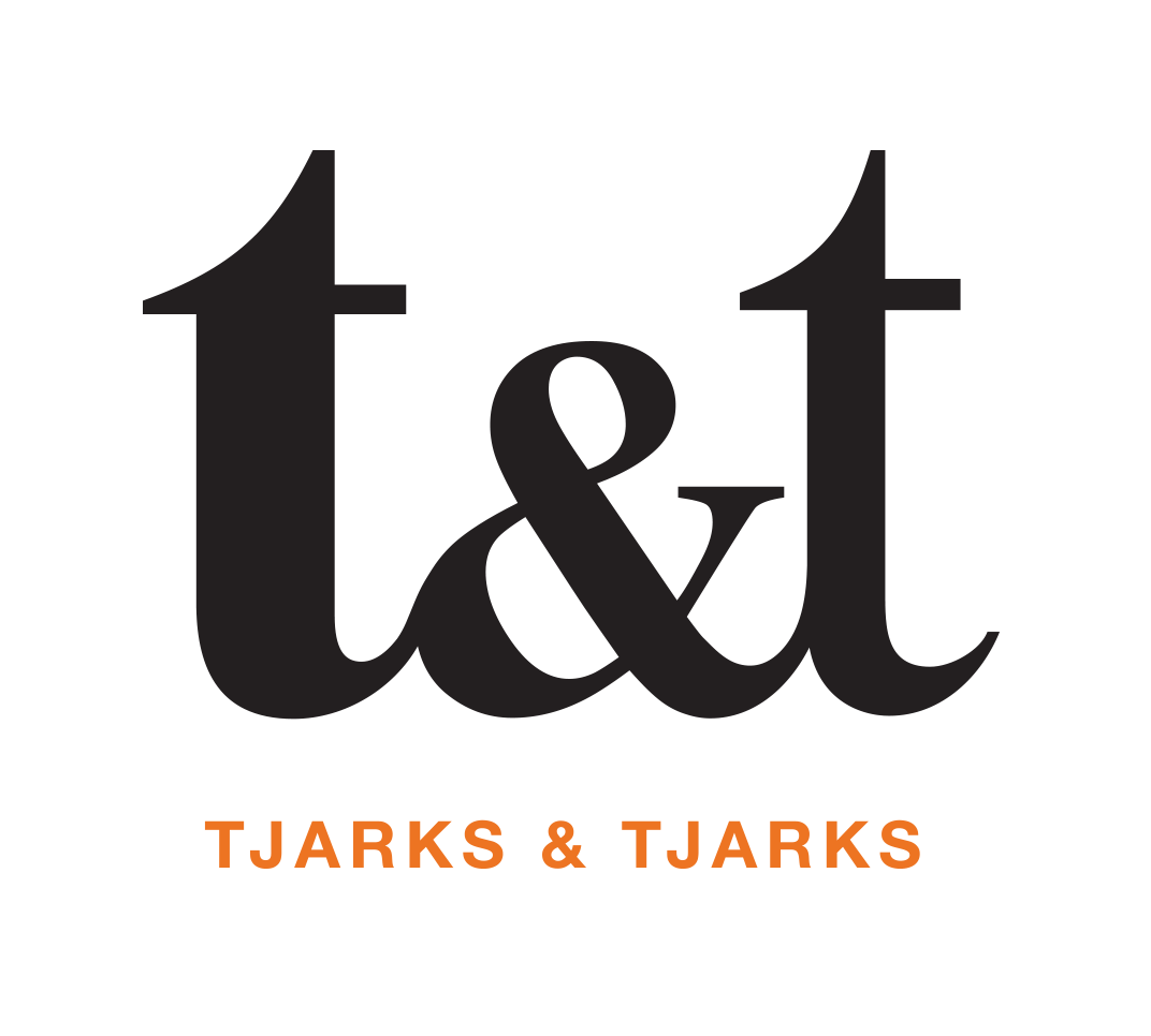 T & t tjarks & tjarks logo on a white background