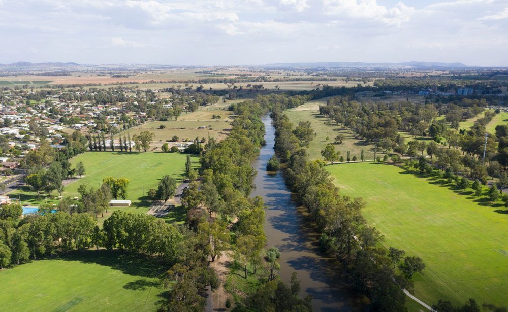 Aerial View Of A River Surrounded By Trees — Surveyor In Cowra, NSW