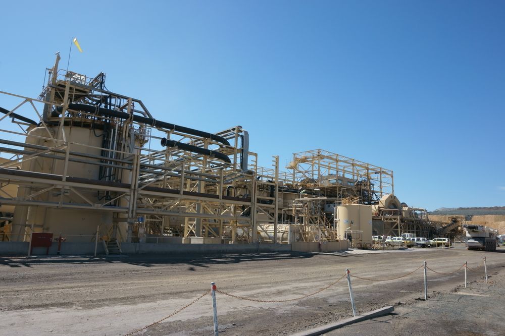 Large Industrial Construction With A Yellow Flag On Top Of It — Surveyor In West Wyalong, NSW
