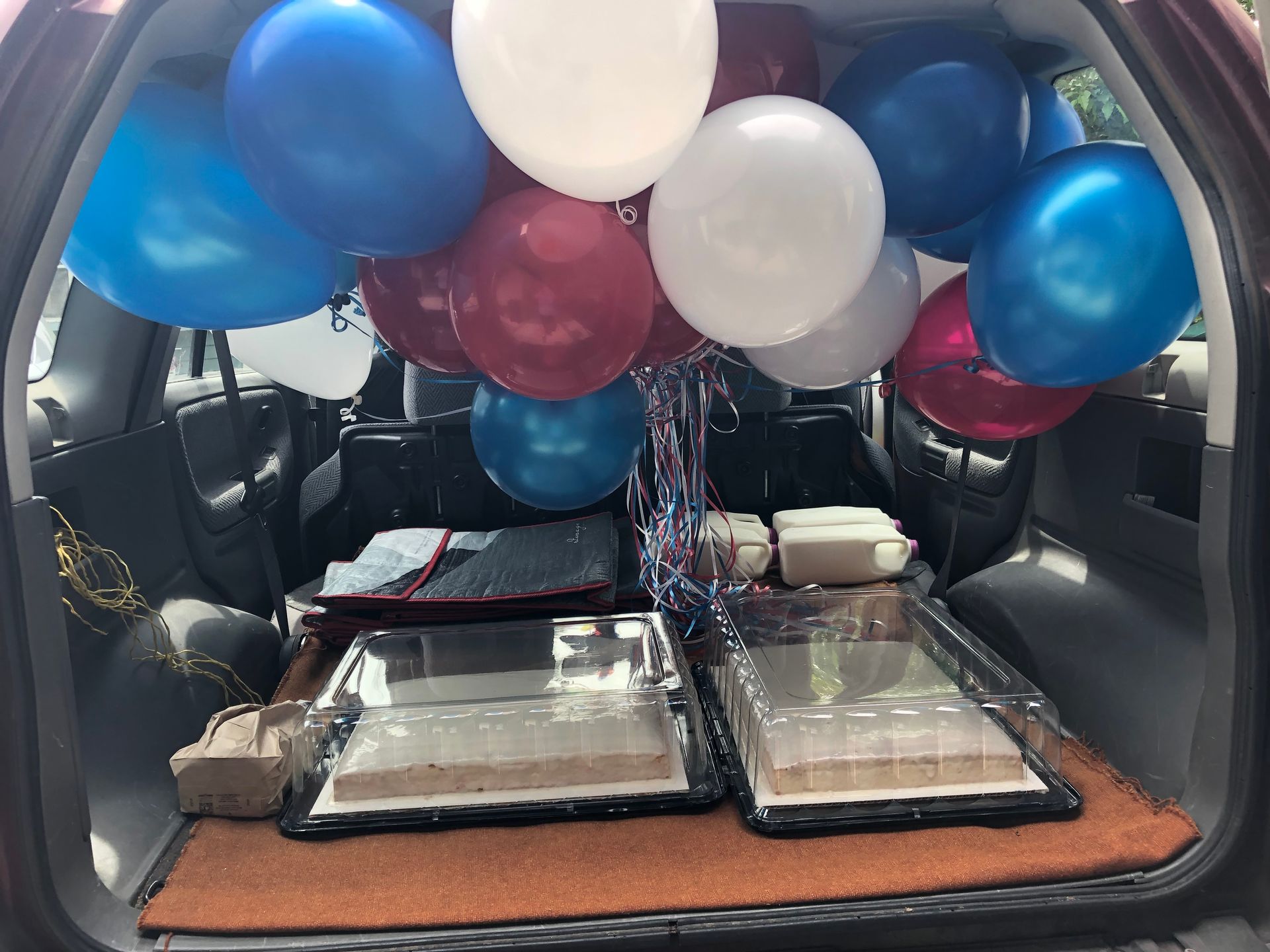 A pizza in a box that says pizza on it