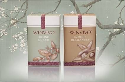 Two WinVivo product boxes: one green 