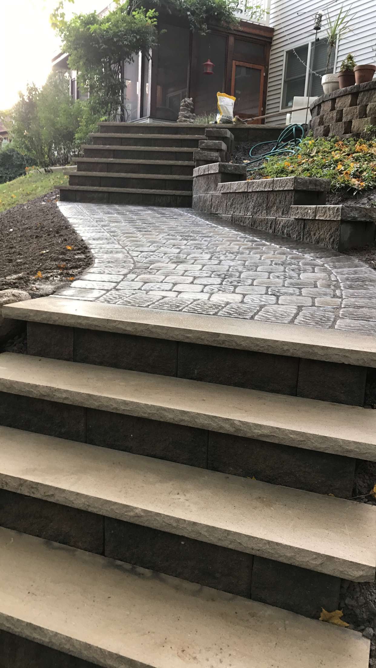 A set of stairs leading up to a house.