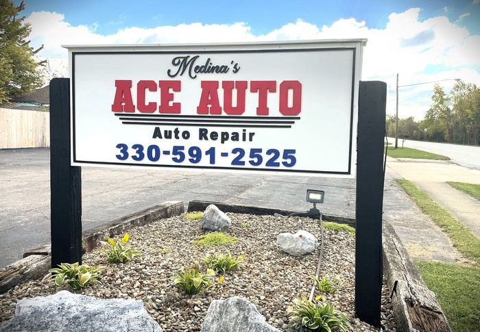 Meller’s ACE AUTO sign with phone number 330-591-2525 beside a roadside in daylight | Medina’s Ace Auto